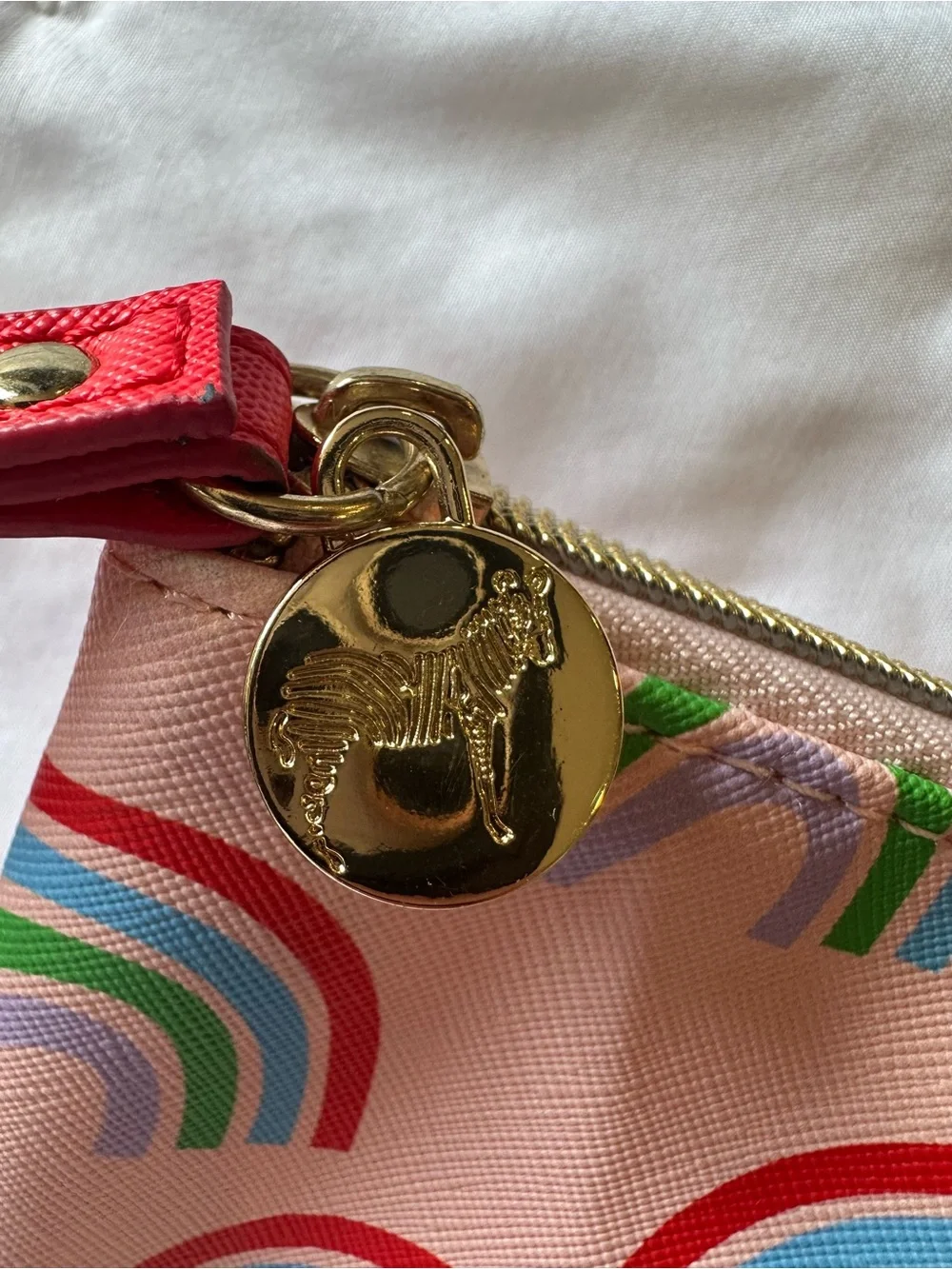 Dabney Lee Rainbow Zipper Pouch with Gold Medallion Charm and Red Accent Bottom